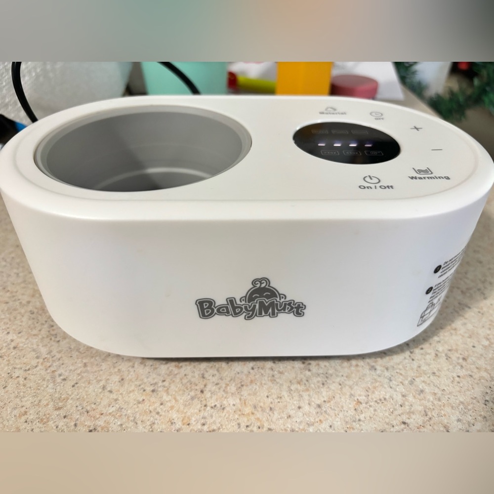 Baby bottle warmer/white/like new
